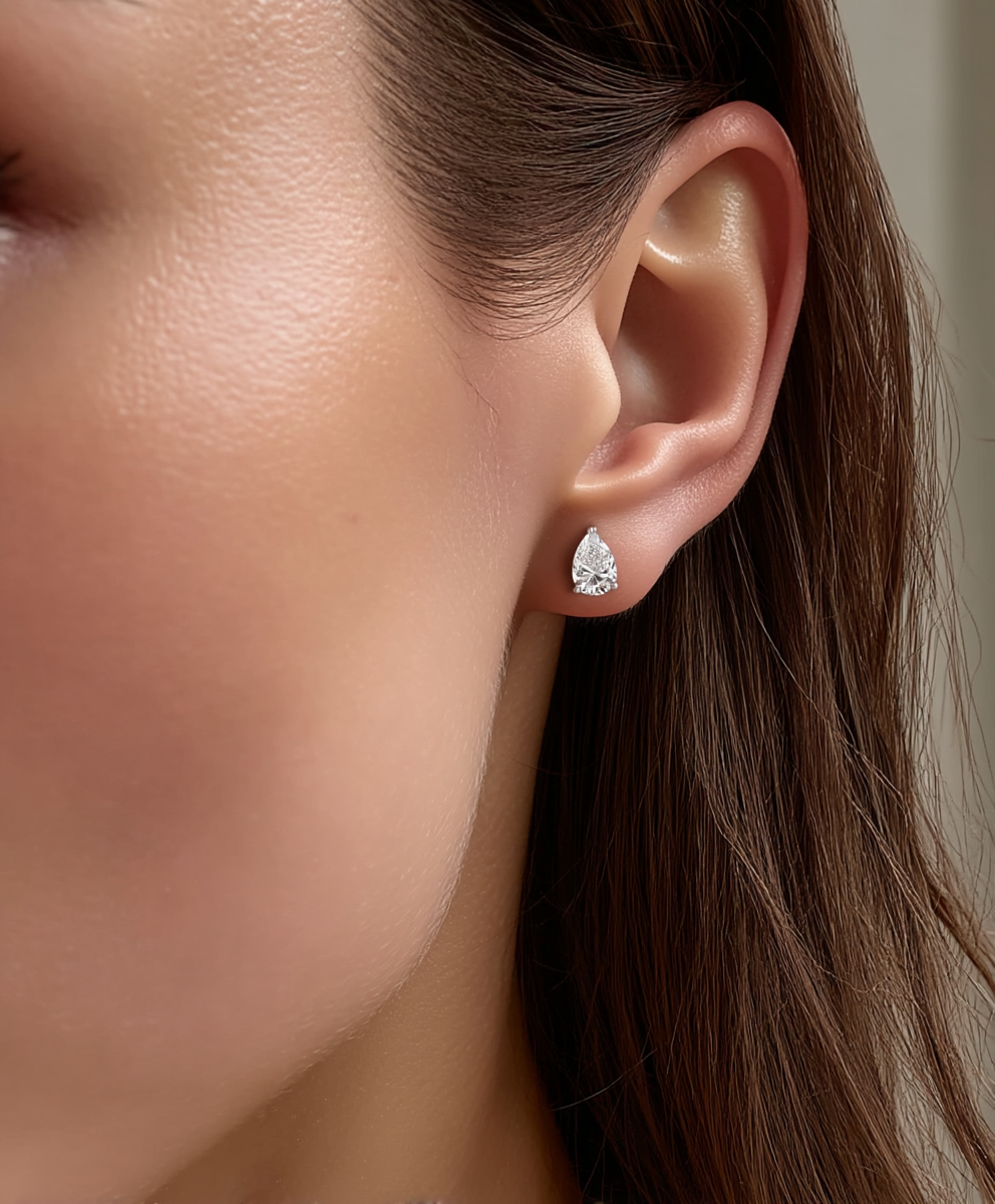 bellari-Pear-Cut Moissanite Stud Earrings on model